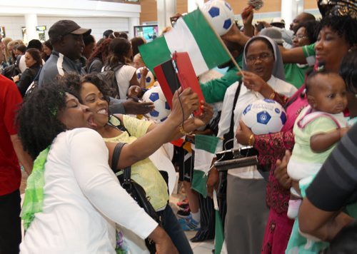 Winnipeg soccer fans take selfie welcome team Nigeria to the James A Richardson International airport Thursday for the 2015 FIFA Womens World Cup  -  Sports- June 04, 2015   (JOE BRYKSA / WINNIPEG FREE PRESS)