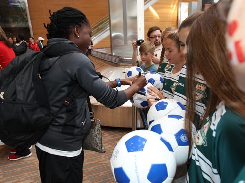 Winnipeg soccer fans welcome team Nigeria ( in black, left) to the James A Richardson International airport Thursday for the 2015 FIFA Womens World Cup  -  Sports- June 04, 2015   (JOE BRYKSA / WINNIPEG FREE PRESS)