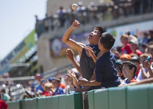 Jerico Yago catches a fly ball at a Goldeyes game versus the Sioux Falls Canaries at Shaw Park on Thursday, June 4, 2015.  Mikaela MacKenzie / Winnipeg Free Press