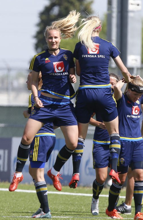 At left,  Team Sweden player Emma Lund goes through a drill with teammate at the team practice held in the Winnipeg Soccer Complex Friday.  The team is here to compete in the FIFA Womens World Cup Canada 2015. Tim Campbell story.  Wayne Glowacki / Winnipeg Free Press June 5 2015