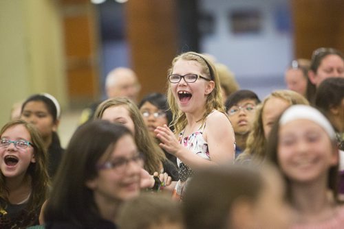 Hannah Lundy, a grade five student at Lakewood School, gasps in excitement as a school patrol award is handed out at the RBC Convention Centre on Friday, June 5, 2015. Mikaela MacKenzie / Winnipeg Free Press