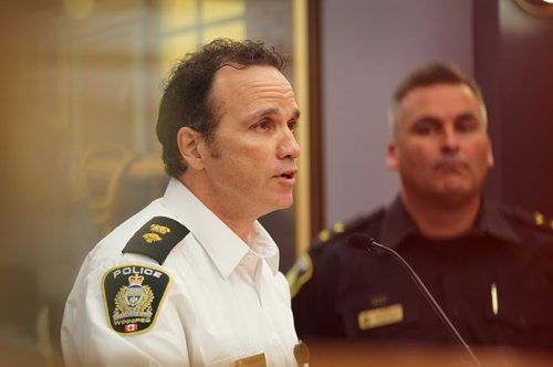 Superintendent Danny Smyth (left) (Constable Jason Michalyshen next to him)  talks to the media about the positive ID of Audrey Desjarlais from a DNA match after her remains were recovered from the Red River earlier this year.  See story.   June 5, 2015 Ruth Bonneville / Winnipeg Free Press