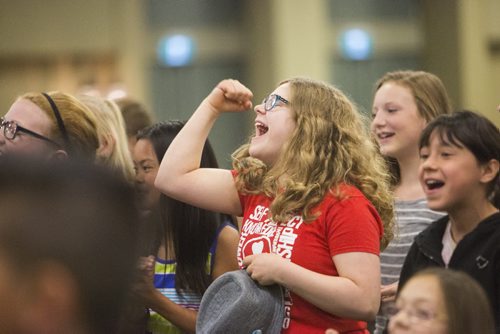 Anaya Borkowski from Ecole Laura Secord screams and pumps her fists when an award is announced at the school patrol awards held at the RBC Convention Centre on Friday, June 5, 2015. Mikaela MacKenzie / Winnipeg Free Press