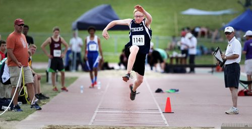 David Muller of Swan Valley Regional School goes for gold in the preliminary event of the Jr Varsity triple jump Friday at the MSHAA Provincial Track and Field Championships at University Stadium at the University of Manitoba. June 5, 2015 - (Phil Hossack / Winnipeg Free Press)