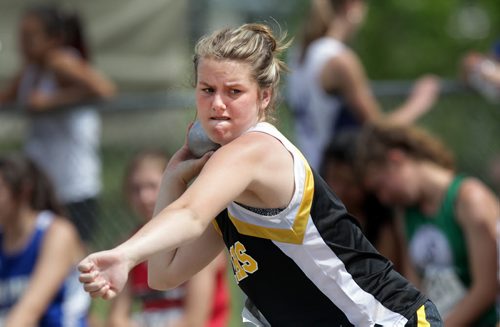 A study in concentration, Taylor Allen, of the Neepawa area Collegiate prepares to hurl the shot put Friday at the MSHAA Provincial Track and Field Championships at University Stadium at the University of Manitoba. June 5, 2015 - (Phil Hossack / Winnipeg Free Press)