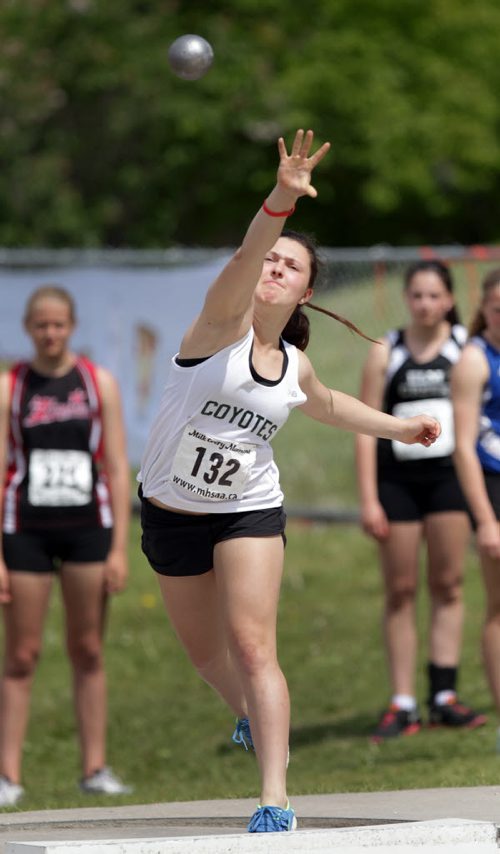 Janelle Delaquis hurls the shot put in jr varsity event Friday at the MSHAA Provincial Track and Field Championships at University Stadium at the University of Manitoba. June 5, 2015 - (Phil Hossack / Winnipeg Free Press)