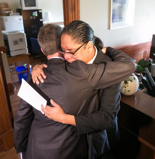 Maeengan Linklater was hugged by Education Minister James Allum after presenting documents for his proposed Manitoba Indian Residential School Genocide and Reconciliation Memorial Day Act to at the Manitoba Legislature Friday afternoon. June 05, 2015 - MELISSA TAIT / WINNIPEG FREE PRESS
