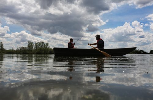 Colin Flemington and his son James decide to start off the weekend early by going fishing together at Fort Whyte Friday afternoon.  James, who is home schooled,  finished his work early allowing time away with dad to enjoy the warm weather.   Standup photo   June 05, 2015 Ruth Bonneville / Winnipeg Free Press