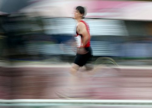 MSHAA Provincial Track and Field Championships during heavy rain, at University Stadium at the University of Manitoba, Saturday, June 6, 2015. (TREVOR HAGAN/WINNIPEG FREE PRESS)