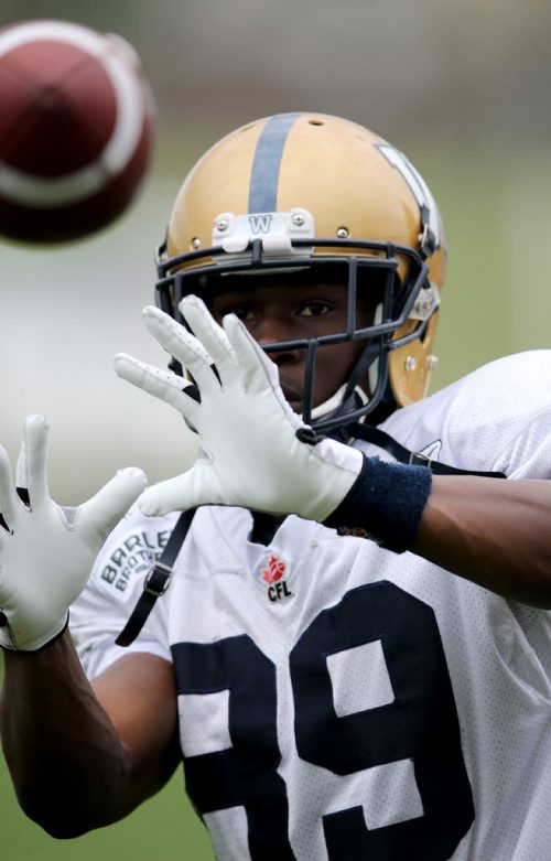 Winnipeg Blue Bombers' Clarence Denmark catches a pass during practice at the University of Manitoba, Saturday, June 6, 2015. (TREVOR HAGAN/WINNIPEG FREE PRESS)
