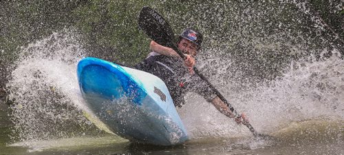 Max Koltek takes a ride down the slide in a whitewater play boat during MEC Paddlefest at FortWhyte Alive Sunday. 150607 - Sunday, June 07, 2015 -  MIKE DEAL / WINNIPEG FREE PRESS