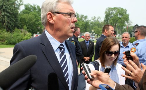 Plans to introduce first-of-its-kind legislation in Canada for post-traumatic stress disorder coverage unveiled at the Front steps of the Legislative Building. Manitoba premier Greg Selinger at the press event. BORIS MINKEVICH/WINNIPEG FREE PRESS June 8, 2015