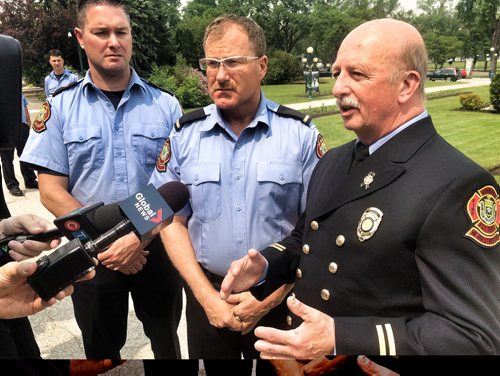 Plans to introduce first-of-its-kind legislation in Canada for post-traumatic stress disorder coverage unveiled at the Front steps of the Legislative Building. Firefighters Chad Swayze, Alex Forrest, and Ed Wiebe talk to the media after the announcement. Both of the firefighters flanking Forrest have PTSD. BORIS MINKEVICH/WINNIPEG FREE PRESS June 8, 2015