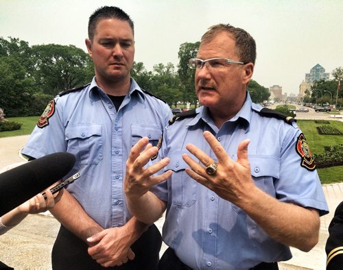 Plans to introduce first-of-its-kind legislation in Canada for post-traumatic stress disorder coverage unveiled at the Front steps of the Legislative Building. Firefighters Chad Swayze and Alex Forrest talk to the media after the announcement. BORIS MINKEVICH/WINNIPEG FREE PRESS June 8, 2015