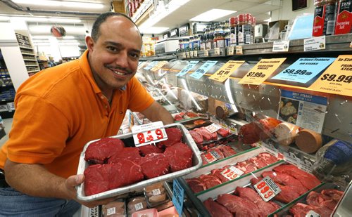 Munther Zeid owner of the FoodFare Store at  2285 Portage Ave. with baseball top sirloin steaks at $9.49 a pound. For the Murray McNeill story on the high the price of beef. Wayne Glowacki / Winnipeg Free Press June 8 2015