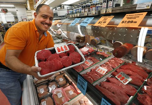 Munther Zeid owner of the FoodFare Store at  2285 Portage Ave. with baseball top sirloin steaks at $9.49 a pound. For Murray McNeill story on the high the price of beef. Wayne Glowacki / Winnipeg Free Press June 8 2015