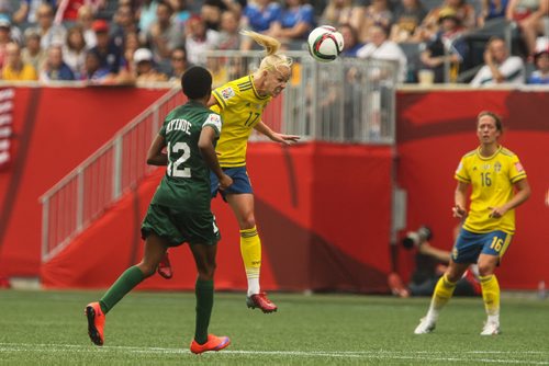 Sweden's Caroline Seger (17) heads the ball during the first half of FIFA Women's World Cup soccer action against Nigeria in Winnipeg on Monday, June 8, 2015. 150608 - Monday, June 08, 2015 -  MIKE DEAL / WINNIPEG FREE PRESS