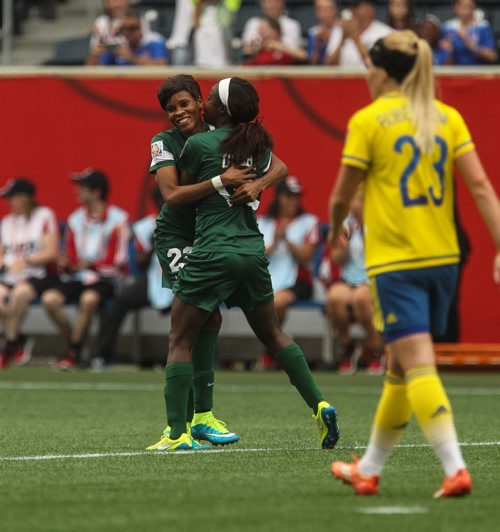 Nigeria celebrates their first goal of the game during the second half of FIFA Women's World Cup soccer action in Winnipeg on Monday, June 8, 2015. 150608 - Monday, June 08, 2015 -  MIKE DEAL / WINNIPEG FREE PRESS