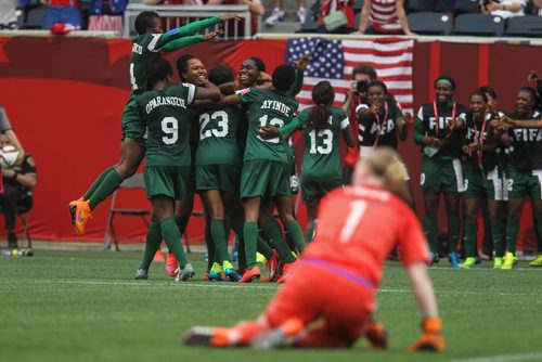 Nigeria celebrates their third and tying goal against Sweden with only minutes left on the clock during the second half of FIFA Women's World Cup soccer action in Winnipeg on Monday, June 8, 2015. 150608 - Monday, June 08, 2015 -  MIKE DEAL / WINNIPEG FREE PRESS