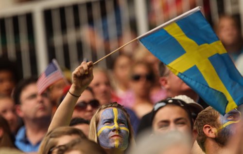 A swedish fan waves a flag during the second half of FIFA Women's World Cup soccer action in Winnipeg on Monday, June 8, 2015. 150608 - Monday, June 08, 2015 -  MIKE DEAL / WINNIPEG FREE PRESS