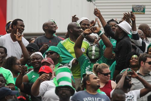 Nigeria fans celebrate during the second half of FIFA Women's World Cup soccer action in Winnipeg on Monday, June 8, 2015. 150608 - Monday, June 08, 2015 -  MIKE DEAL / WINNIPEG FREE PRESS
