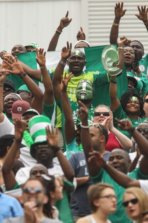 Nigeria fans celebrate during the second half of FIFA Women's World Cup soccer action in Winnipeg on Monday, June 8, 2015. 150608 - Monday, June 08, 2015 -  MIKE DEAL / WINNIPEG FREE PRESS