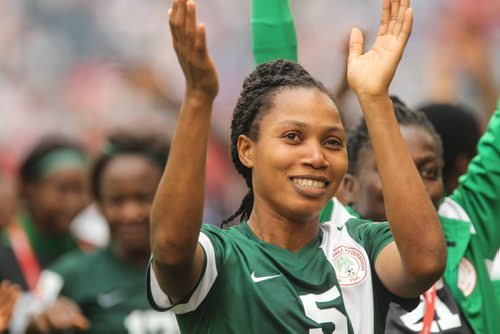 Nigeria's Onome Ebi (5) acknowledges their fans after tying Sweden 3-3 in FIFA Women's World Cup soccer action in Winnipeg on Monday, June 8, 2015. 150608 - Monday, June 08, 2015 -  MIKE DEAL / WINNIPEG FREE PRESS
