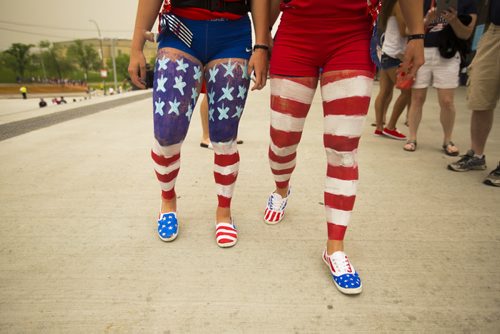 Felicia Roppe (left) and Kayla Dowell, who both play soccer at Central College in Iowa, painted their legs to go see the Nigeria vs. Sweden game at the Investors Group Field on Monday, June 8, 2015. Mikaela MacKenzie / Winnipeg Free Press