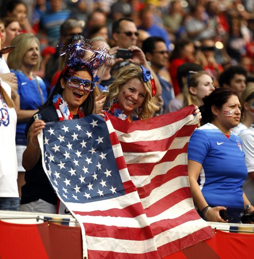 All American!!  Team USA fans strut thier stuff MOnday at Investor's Group Field waiting for the match between teams USA and Australia. June 8, 2015 - (Phil Hossack / Winnipeg Free Press)