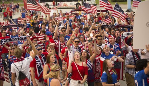 Members of the soccer fan group the American Outlaws march up to the stadium to see the FIFA World Cup United States vs. Australia game at the Investors Group Field on Monday, June 8, 2015. Mikaela MacKenzie / Winnipeg Free Press