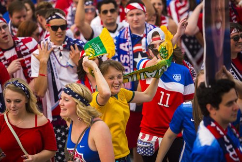 A team Australia fan dances through the sea of red, white, and blue outside the FIFA World Cup United States vs. Australia game at the Investors Group Field on Monday, June 8, 2015. Mikaela MacKenzie / Winnipeg Free Press