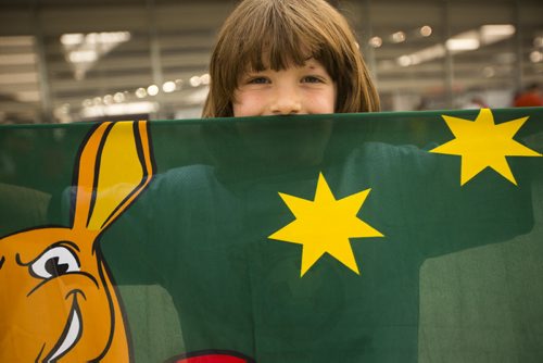 Spencer Merlino, six, holds up his Australian banner before going into the stadium at the FIFA World Cup United States vs. Australia game at the Investors Group Field on Monday, June 8, 2015.  Spencer was born in Sydney, Australia, and now lives in Kenora. Mikaela MacKenzie / Winnipeg Free Press