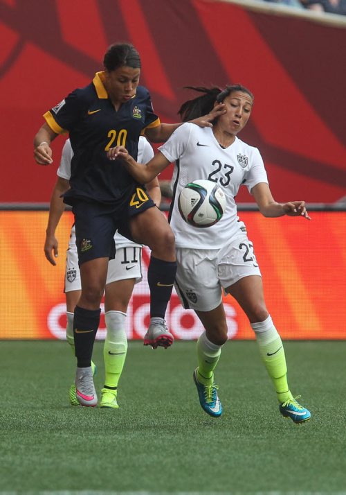 Australia's Samantha Kerr (20) and USA's Christen Press (23) during FIFA Women's World Cup soccer action in Winnipeg on Monday, June 8, 2015. 150608 - Monday, June 08, 2015 -  MIKE DEAL / WINNIPEG FREE PRESS