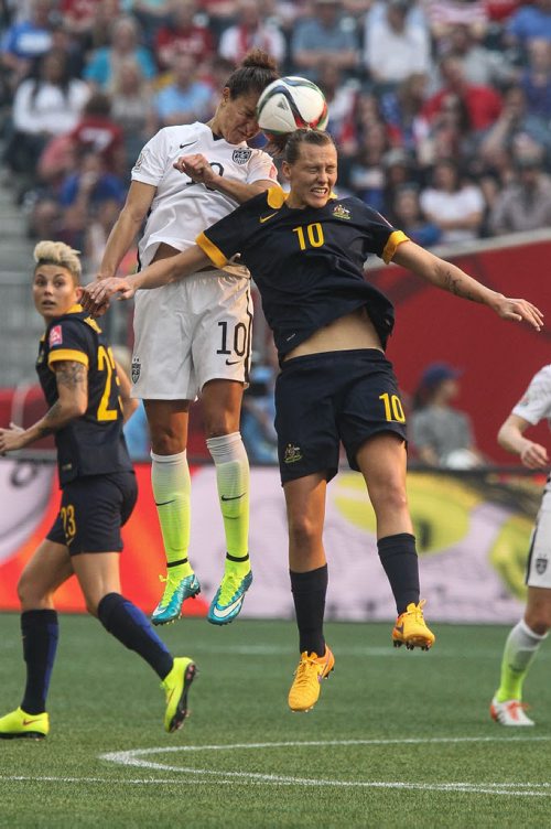 Australia's Emily Van Egmond (10) and USA's Carli Lloyd (10) try to head the ball during FIFA Women's World Cup soccer action in Winnipeg on Monday, June 8, 2015. 150608 - Monday, June 08, 2015 -  MIKE DEAL / WINNIPEG FREE PRESS