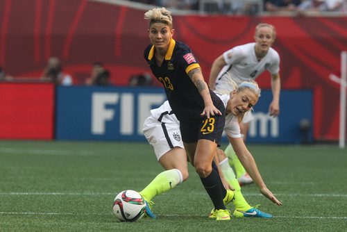 USA's Julie Johnston (19) tries to take the ball away from Australia's Michelle Heyman (23) during FIFA Women's World Cup soccer action in Winnipeg on Monday, June 8, 2015. 150608 - Monday, June 08, 2015 -  MIKE DEAL / WINNIPEG FREE PRESS