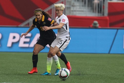 USA's Megan Rapinoe (15) gets in the way of Australia's Servet Uzunlar (6) during the second half of FIFA Women's World Cup soccer action in Winnipeg on Monday, June 8, 2015. 150608 - Monday, June 08, 2015 -  MIKE DEAL / WINNIPEG FREE PRESS