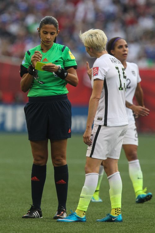 USA's Megan Rapinoe (15) is yellow carded after pushing down Australia's Lisa De Vanna (11) during the second half of FIFA Women's World Cup soccer action in Winnipeg on Monday, June 8, 2015. 150608 - Monday, June 08, 2015 -  MIKE DEAL / WINNIPEG FREE PRESS