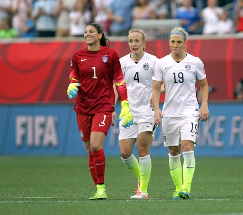 USA netminder #1 Hope Solo, #4 Becky Saurbrunn and #19 Julie Johnston leave the pitch  Monday evening at Investor's Field after defeating the Australian team 3-1.  June 8, 2015 - (Phil Hossack / Winnipeg Free Press)