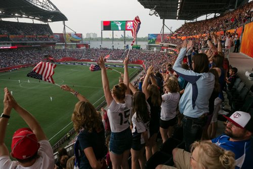 USA fans cheer in the stands at Investors Group Field, now known as Winnipeg Stadium, for the FIFA Women's World Cup. June 08, 2015 - MELISSA TAIT / WINNIPEG FREE PRESS