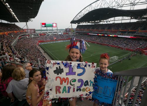 Elise Rykhus (left) and Heather Shearman. from Mankato, Minnesota in the stands at Investors Group Field, now known as Winnipeg Stadium, for the FIFA Women's World Cup. June 08, 2015 - MELISSA TAIT / WINNIPEG FREE PRESS