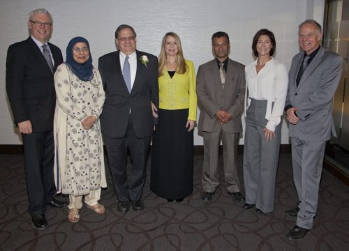 The Islamic Social Services Association held its biannual fundraising dinner on May 29, 2015. Ihsan Awards were presented to two lawyers for their support of the Muslim community. Pictured, from left, are Premier Greg Selinger, Shahina Siddiqui (ISSA president), Frank Lavitt (award winner), Ahava Halpern, Saif Khan, Stacy Wytinck and Jon Gerrard (MLA, River Heights). (JOHN JOHNSTON / WINNIPEG FREE PRESS)