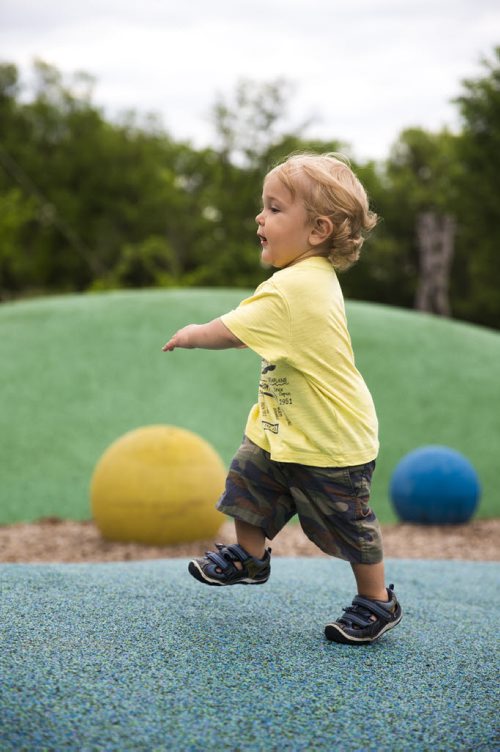 David Kleiner, 14 months, runs up to a small slide in Assiniboine Park in Winnipeg on Tuesday, June 9, 2015. Mikaela MacKenzie / Winnipeg Free Press