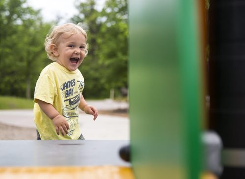 David Kleiner, 14 months, runs up to a small slide in Assiniboine Park in Winnipeg on Tuesday, June 9, 2015. Mikaela MacKenzie / Winnipeg Free Press