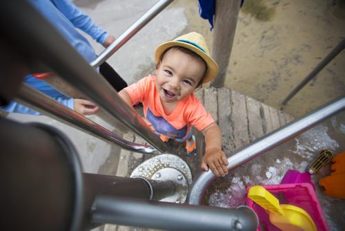 Rhys Daulat, 14 months, plays in the water on a warm but overcast day in Assiniboine Park in Winnipeg on Tuesday, June 9, 2015. Mikaela MacKenzie / Winnipeg Free Press