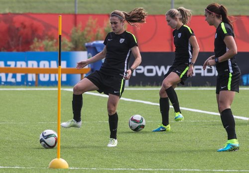 Heather O'Reilly (left) from team USA during practice at the Waverly Soccer Complex Tuesday morning. 150609 - Tuesday, June 09, 2015 -  MIKE DEAL / WINNIPEG FREE PRESS