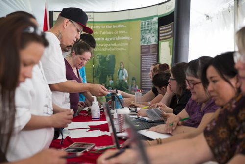 First Nations people receive their treaty cheques at the Forks in Winnipeg on Tuesday, June 9, 2015. Mikaela MacKenzie / Winnipeg Free Press
