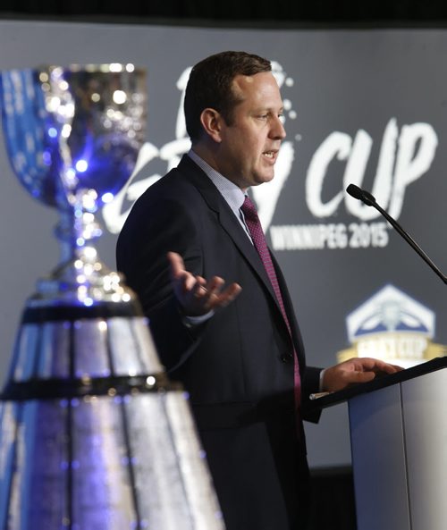 Jason Smith, pres. of the 103rd Grey Cup Festival along with the Grey Cup at the University of Winnipegs Health & RecPlex Tuesday for the announcement of the festival events Nov.25-29. Scott Billeck story. Wayne Glowacki / Winnipeg Free Press June 9 2015