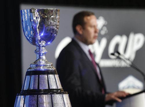 Jason Smith, pres. of the 103rd Grey Cup Festival along with the Grey Cup at the University of Winnipegs Health & RecPlex Tuesday for the announcement of the festival events Nov.25-29. Scott Billeck story. Wayne Glowacki / Winnipeg Free Press June 9 2015