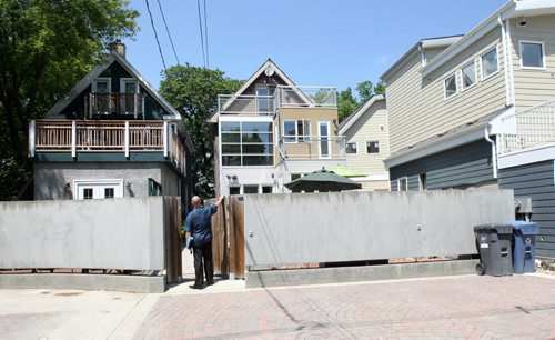 606 Jessie Avenue in Crescentwood-Interesting fence to rear lane- See Todd Lewys story- June 09, 2015   (JOE BRYKSA / WINNIPEG FREE PRESS)