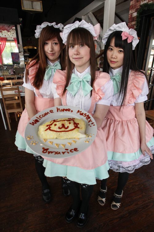 Dwarf no Cachette, a Japanese restaurant that incorporates cos-play, anime and japanese subculture into its offerings. Tuesdays is Maid Cafe day at the restaurant. This is where with a $2.50 ticket you will be served and entertained by the waitresses dressed up in maid costumes. (l-r) Cameron Foy as Melon, Ashley Wakely as Ichigo (Strawberry) and Christina Xue as Sakura (Cherry). 150609 - Tuesday, June 09, 2015 -  MIKE DEAL / WINNIPEG FREE PRESS